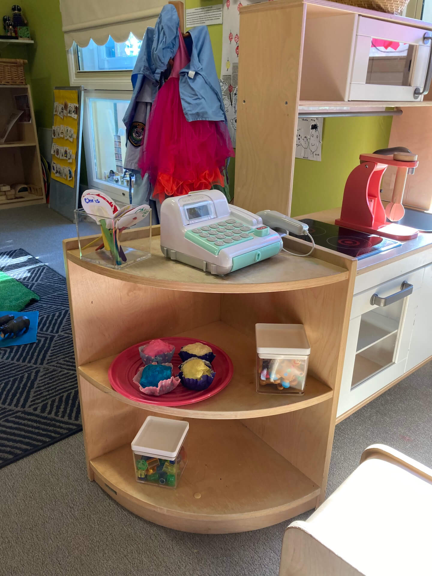 Toy cash register for preschool dramatic play- a bakery