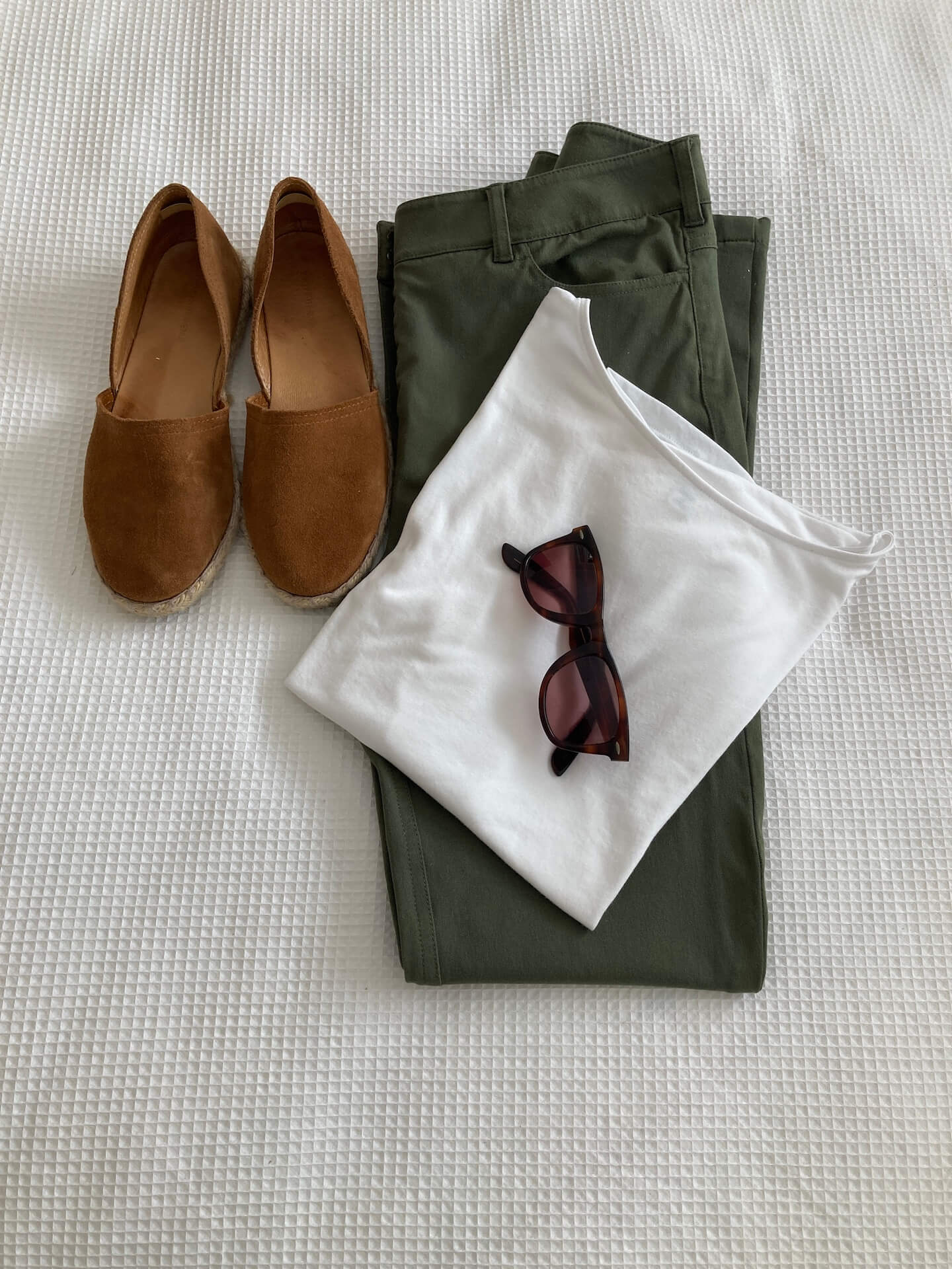 white t-shirt with green pants