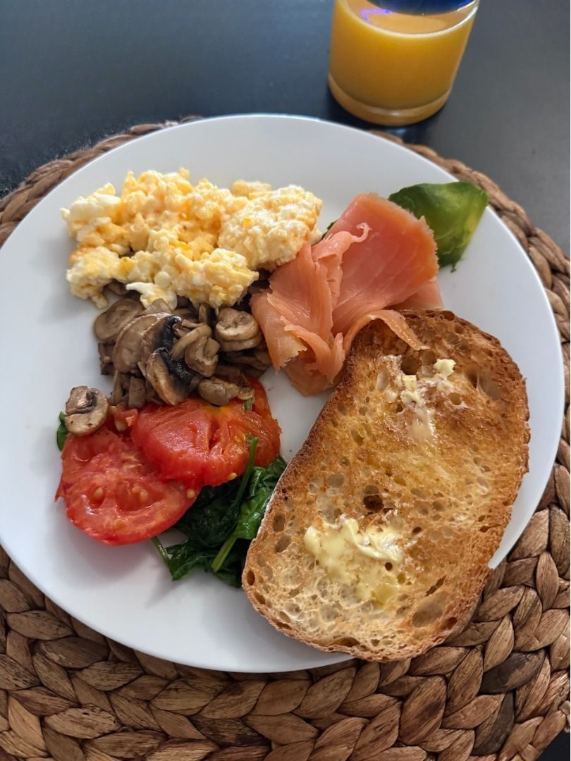 best brunch ideas-plate of eggs, salmon and vegetables