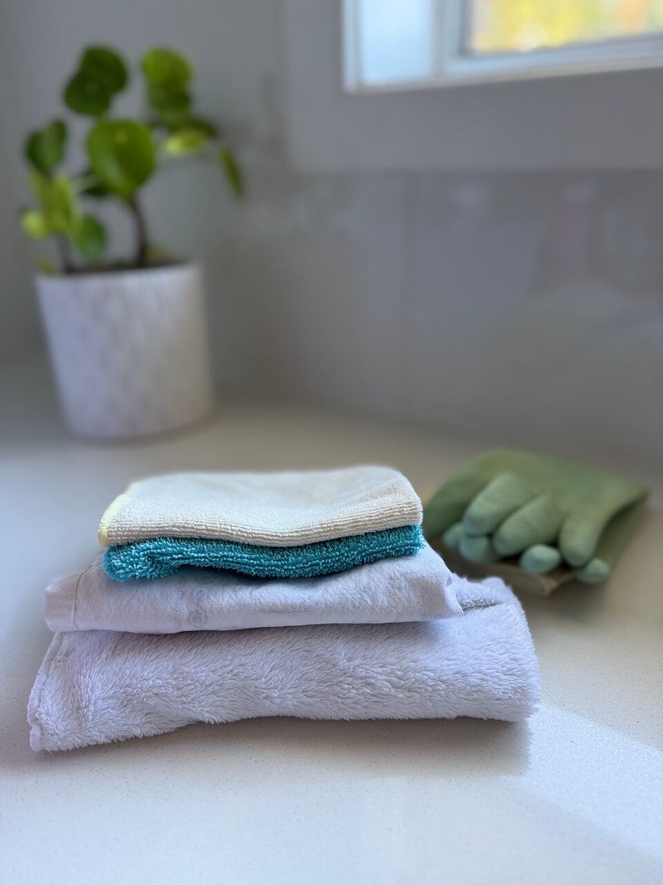 inside my cleaning caddy-cloths and gloves