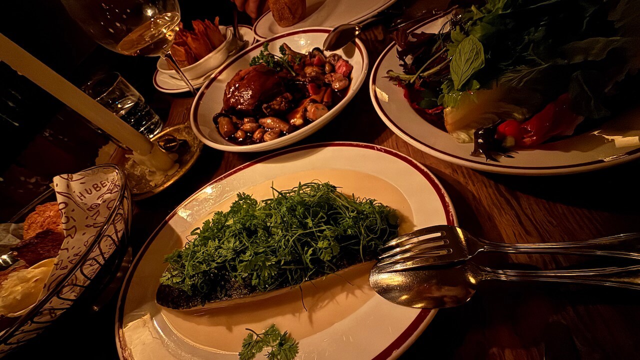 Beef bourguignon, Murray cod, bitter leaf salad and pommes Anna at Restaurant Hubert